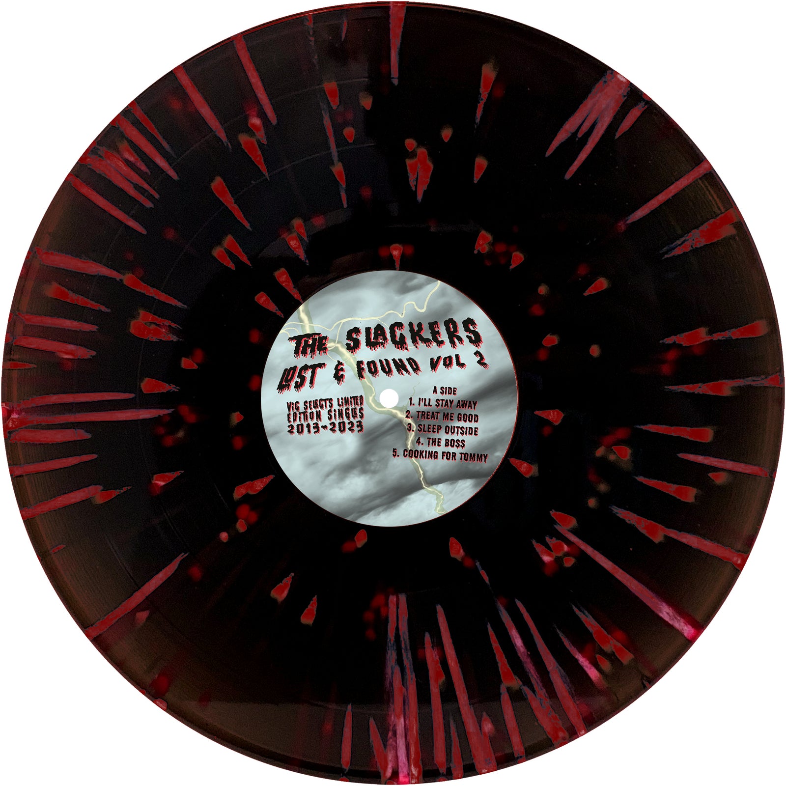 A black vinyl record by The Slackers, with red splatters and a marbled gray-white label, reads: Lost & Found Vol 2, featuring ska reggae rarities and tracks from 2013–2023.