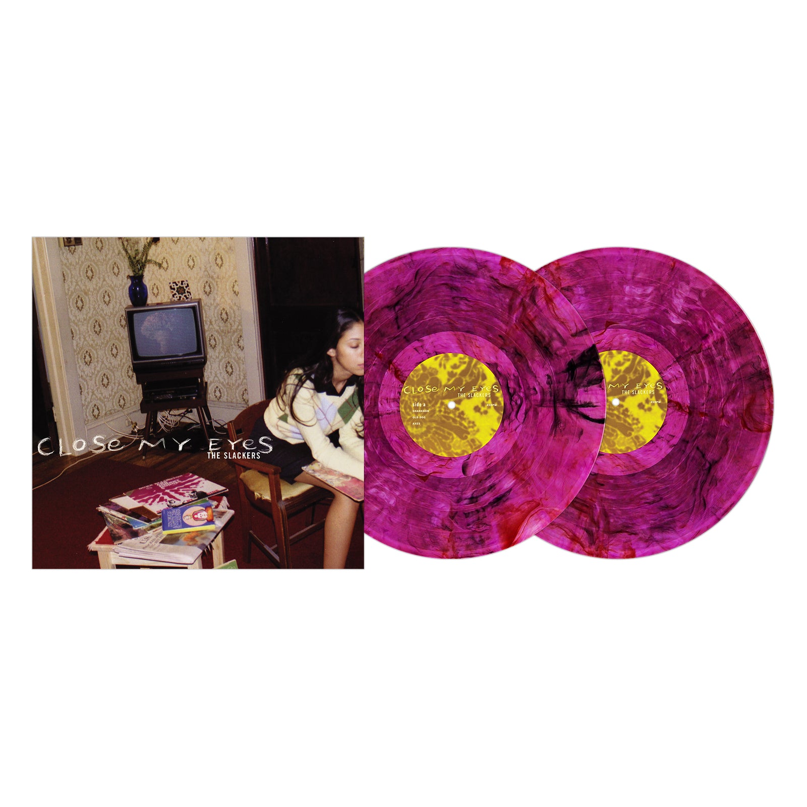 A woman sits by a small table in a living room, next to two magenta marbled vinyl records with yellow centers—The Slackers Close My Eyes album cover is shown on a white background.