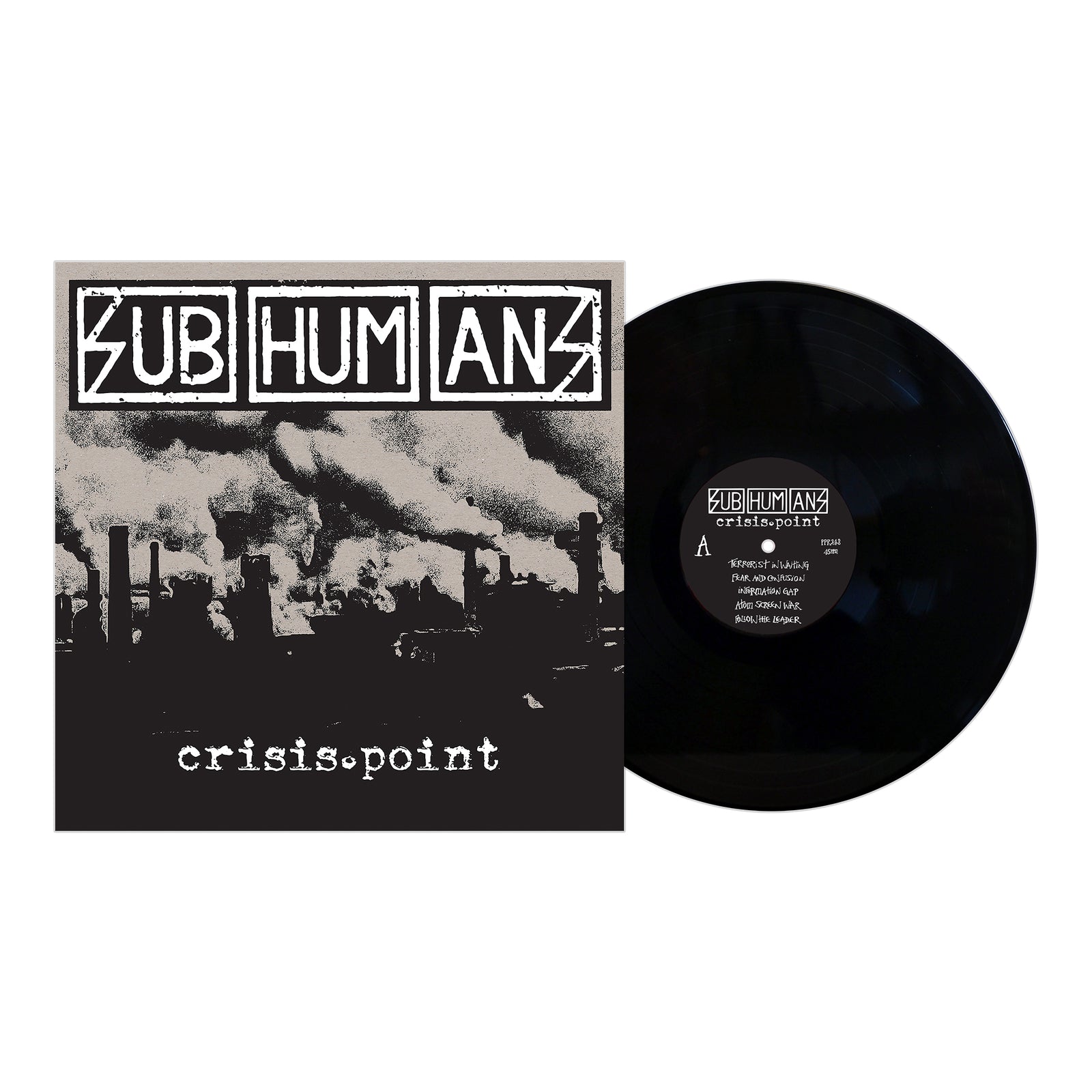 A vinyl record beside its cover featuring the Subhumans band logo, a dark industrial scene with smokestacks, and the album title Crisis Point in white—an iconic release from UK Anarcho-Punk pioneers Subhumans.