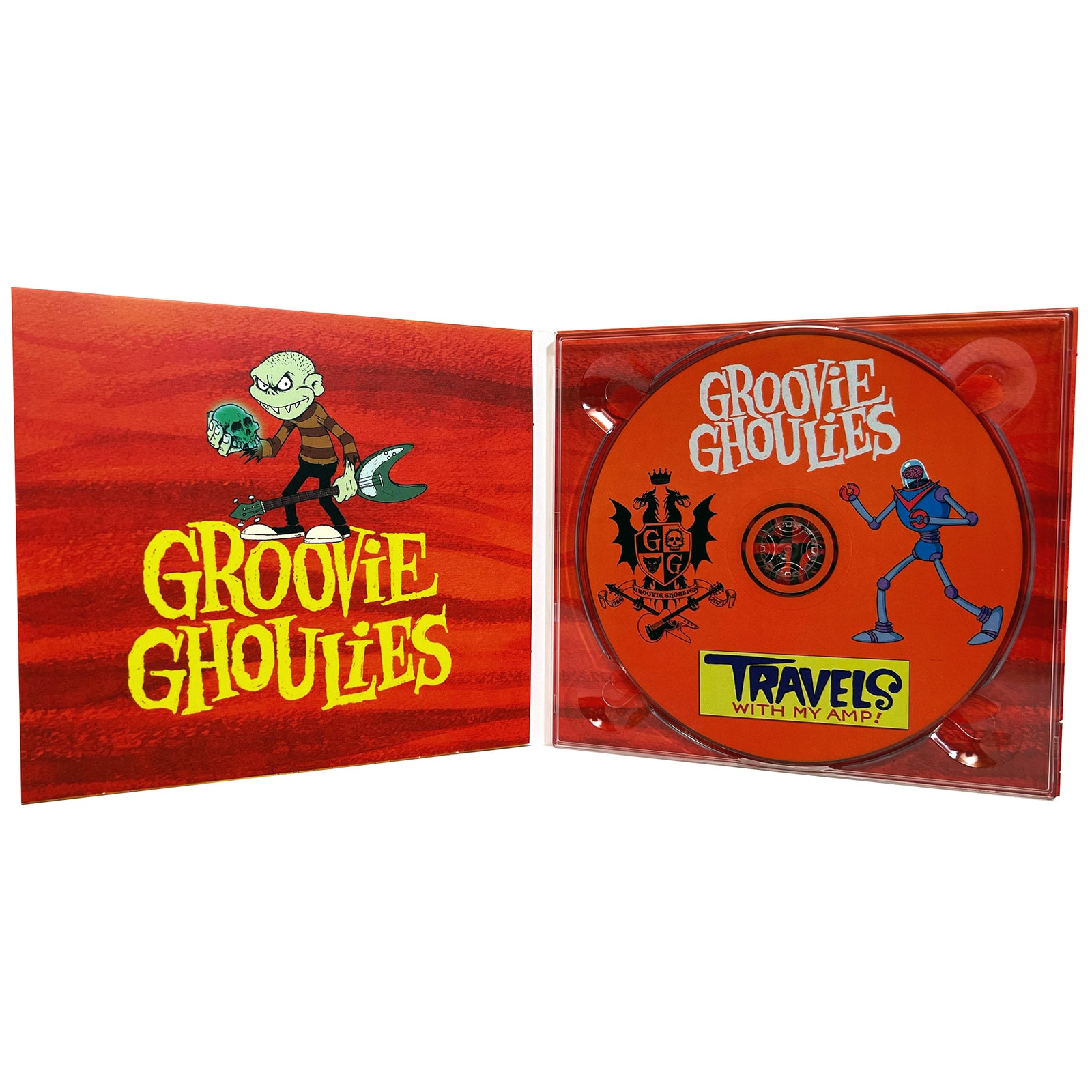 An open CD case shows Groovie Ghoulies’ album Travels With My Amp. Cartoon monsters appear above yellow text on the left, and an orange CD with monster art and Pirates Press Records branding is on the right.