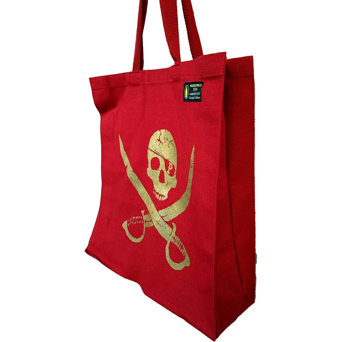 Carry your essentials in style with this Pirates Press Records canvas tote—a red gusset bag with two handles, featuring a yellow skull and crossed swords graphic inspired by classic pirate flags.