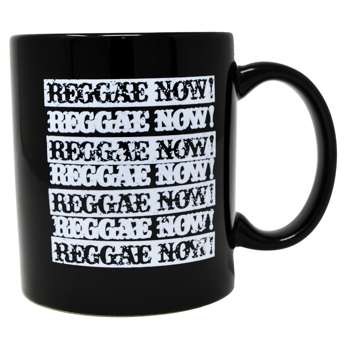 A black coffee mug by The Aggrolites features “REGGAE NOW!”—inspired by the band—printed multiple times in bold, distressed white letters stacked vertically on one side.
