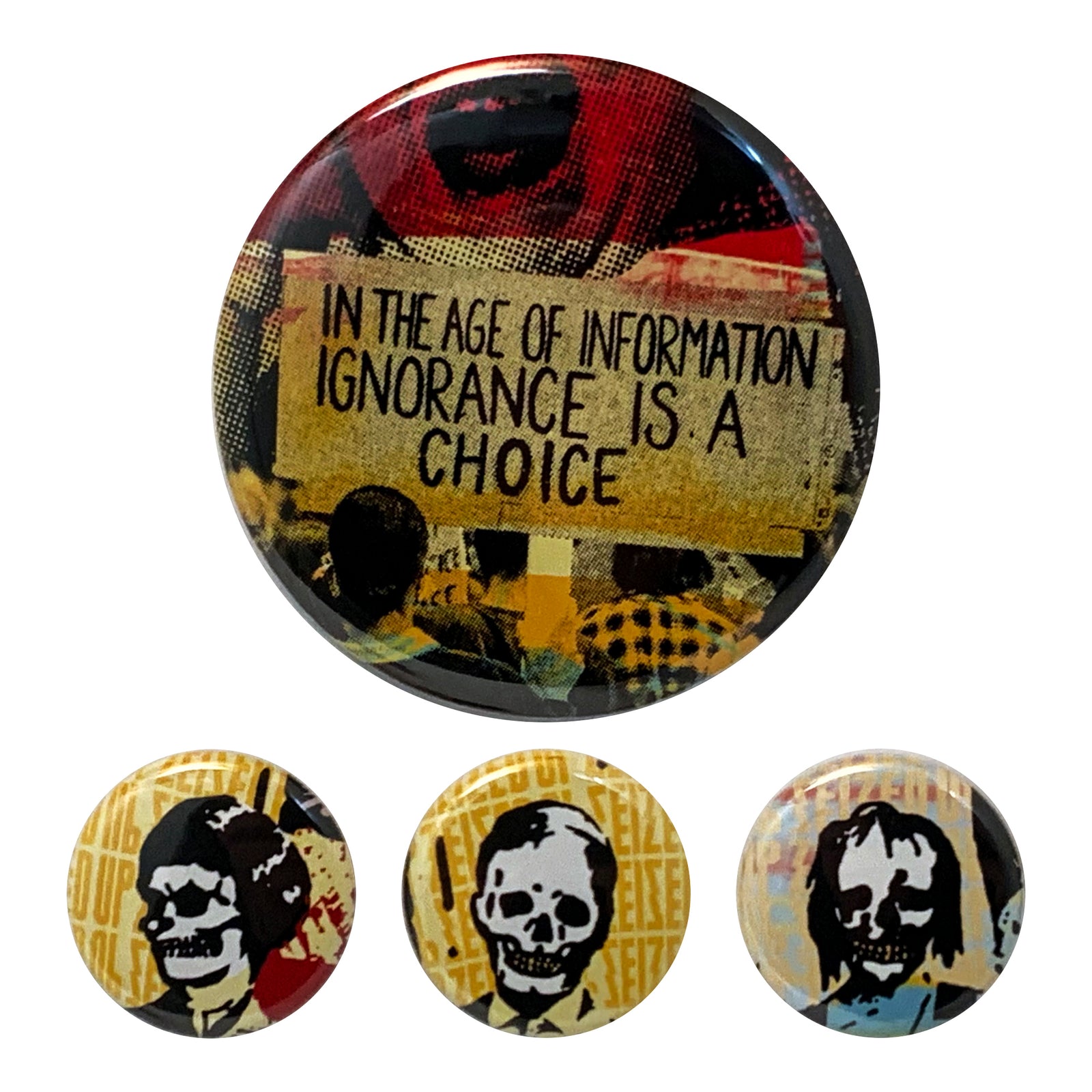 The Seized Up button pack includes a 2.25" pin saying "In the age of information, ignorance is a choice," and three 1" pins with stylized skulls and faces—four unique round pins from Seized Up.
