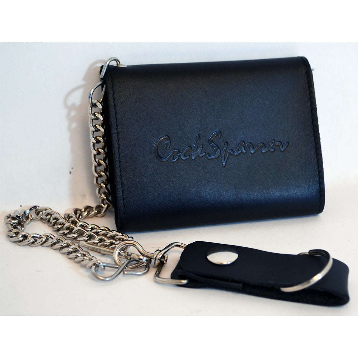 A Cock Sparrer black leather biker wallet, embossed with the brand logo, features a silver chain and snap-button keyring strap, shown against a plain background.