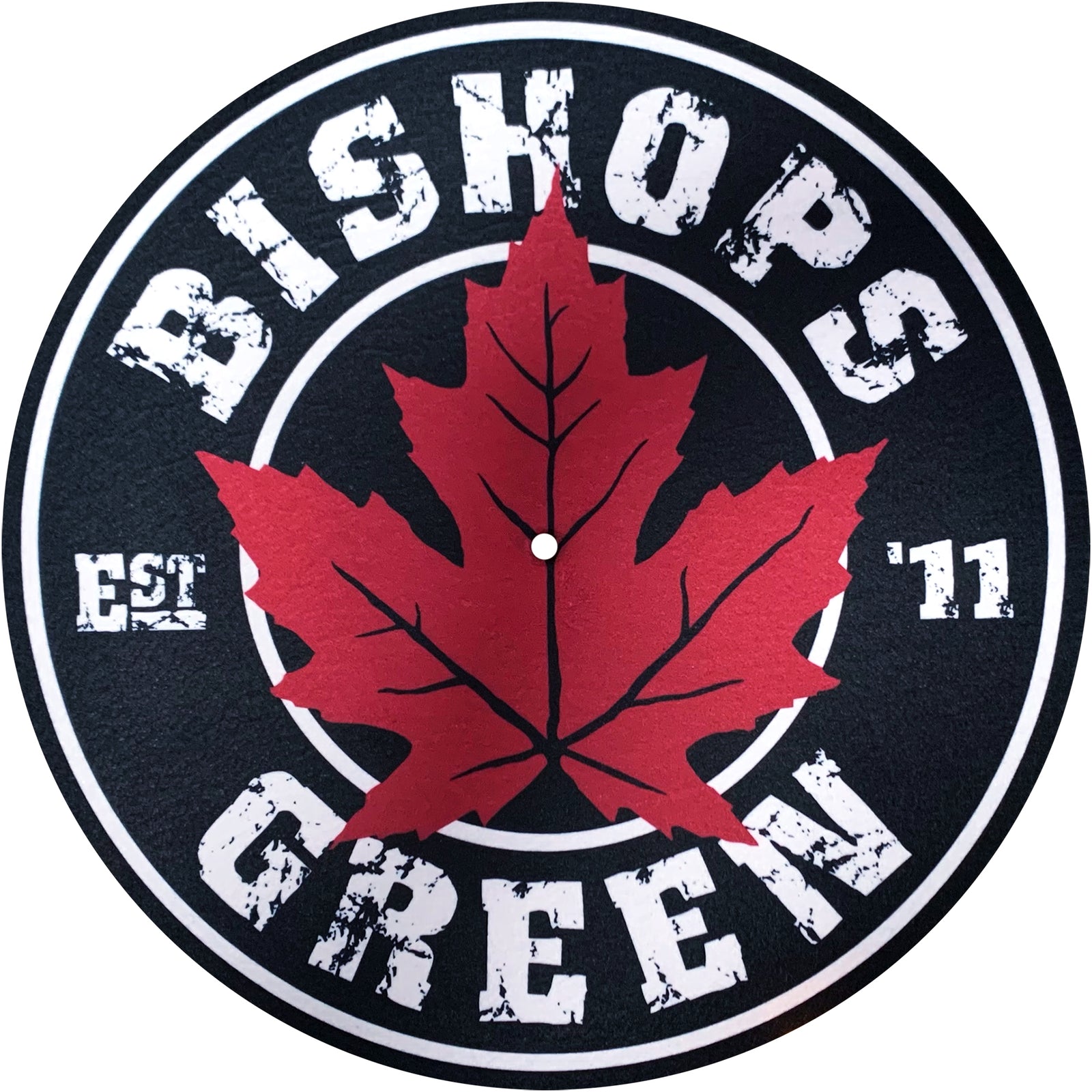 A bold DJ slipmat by Bishops Green featuring a red maple leaf at the center, distressed white BISHOPS GREEN text around it, EST 11 on each side, all set against a black background.