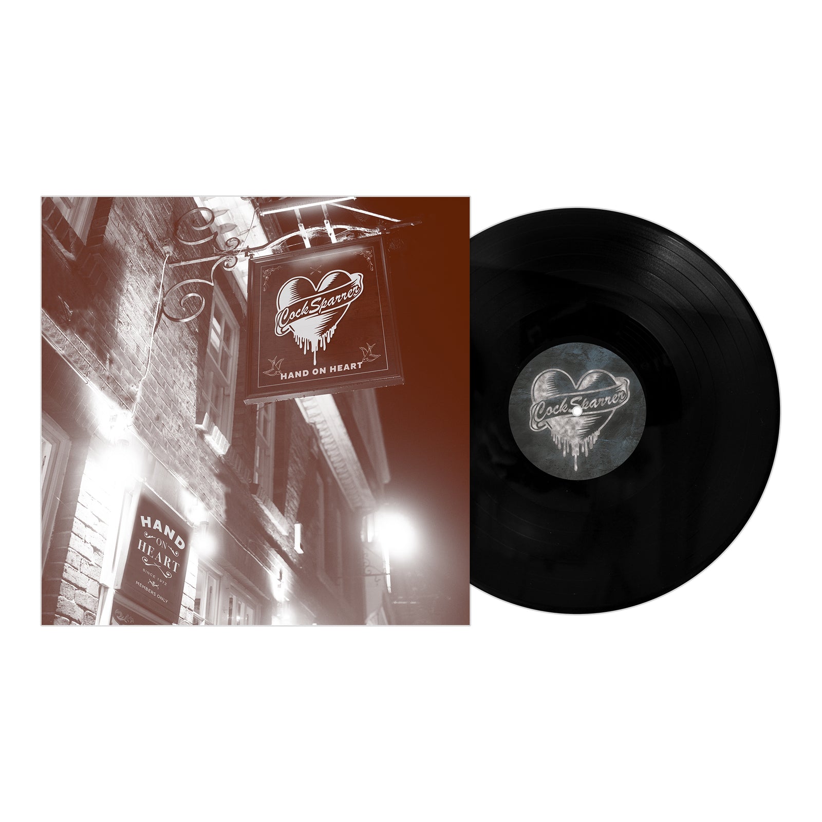 A vinyl record by Cock Sparrer is shown beside its cover, displaying a sepia photo of a brick building at night with a Hand on Heart sign—a must-have for Cock Sparrer fans and punk rock collectors.