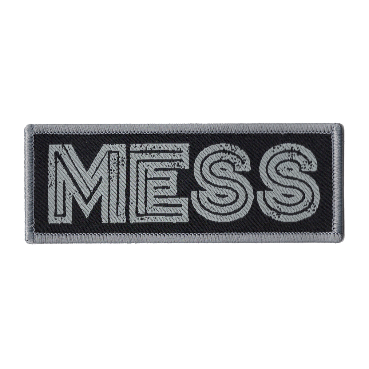 A rectangular Mess brand woven patch features a gray border, black background, and large distressed gray MESS lettering—making it an ideal bold gray-on-black accent for jackets or bags.