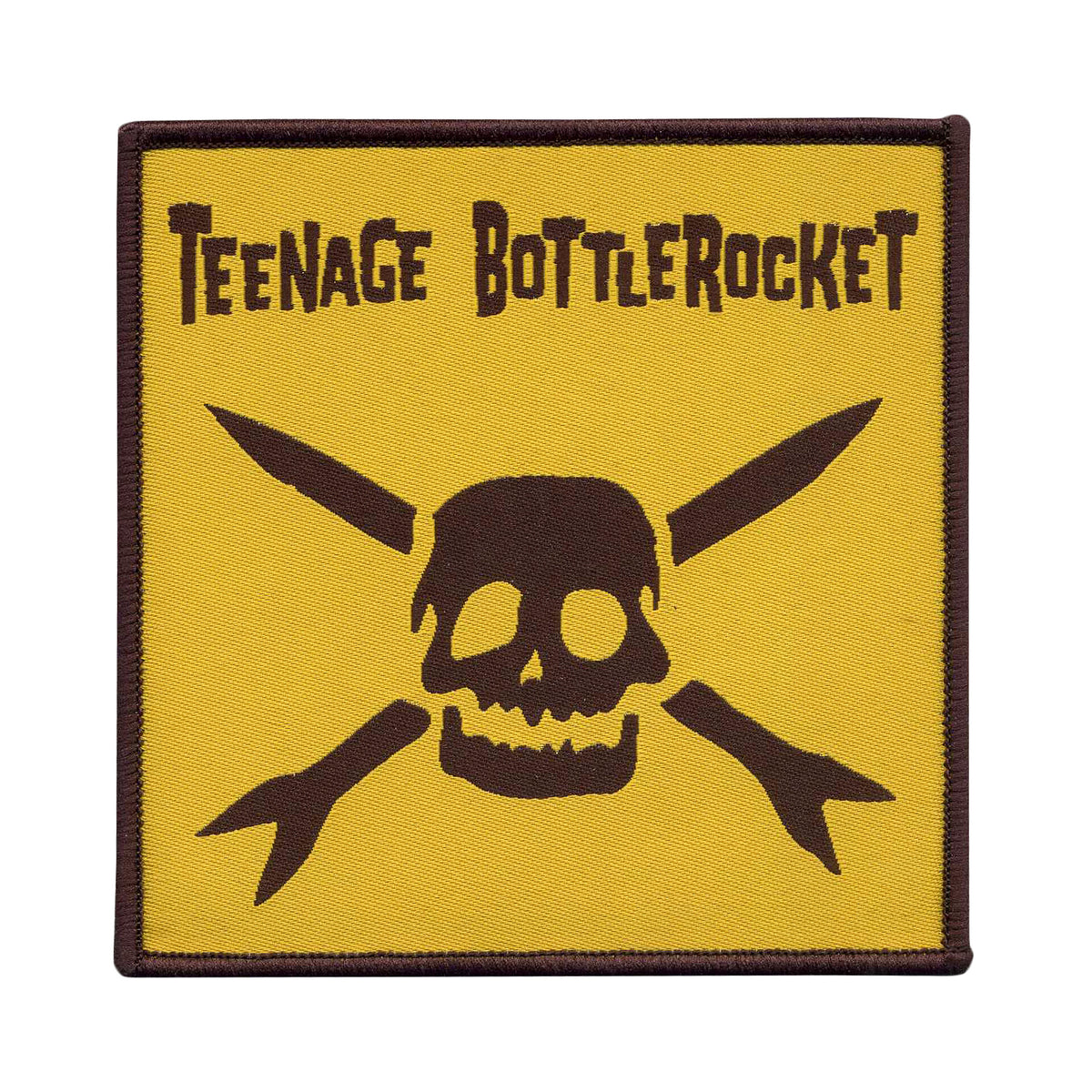 This 4 x 4 yellow square patch by Teenage Bottlerocket features a dark brown skull with crossed rockets and stylized branding at the top.