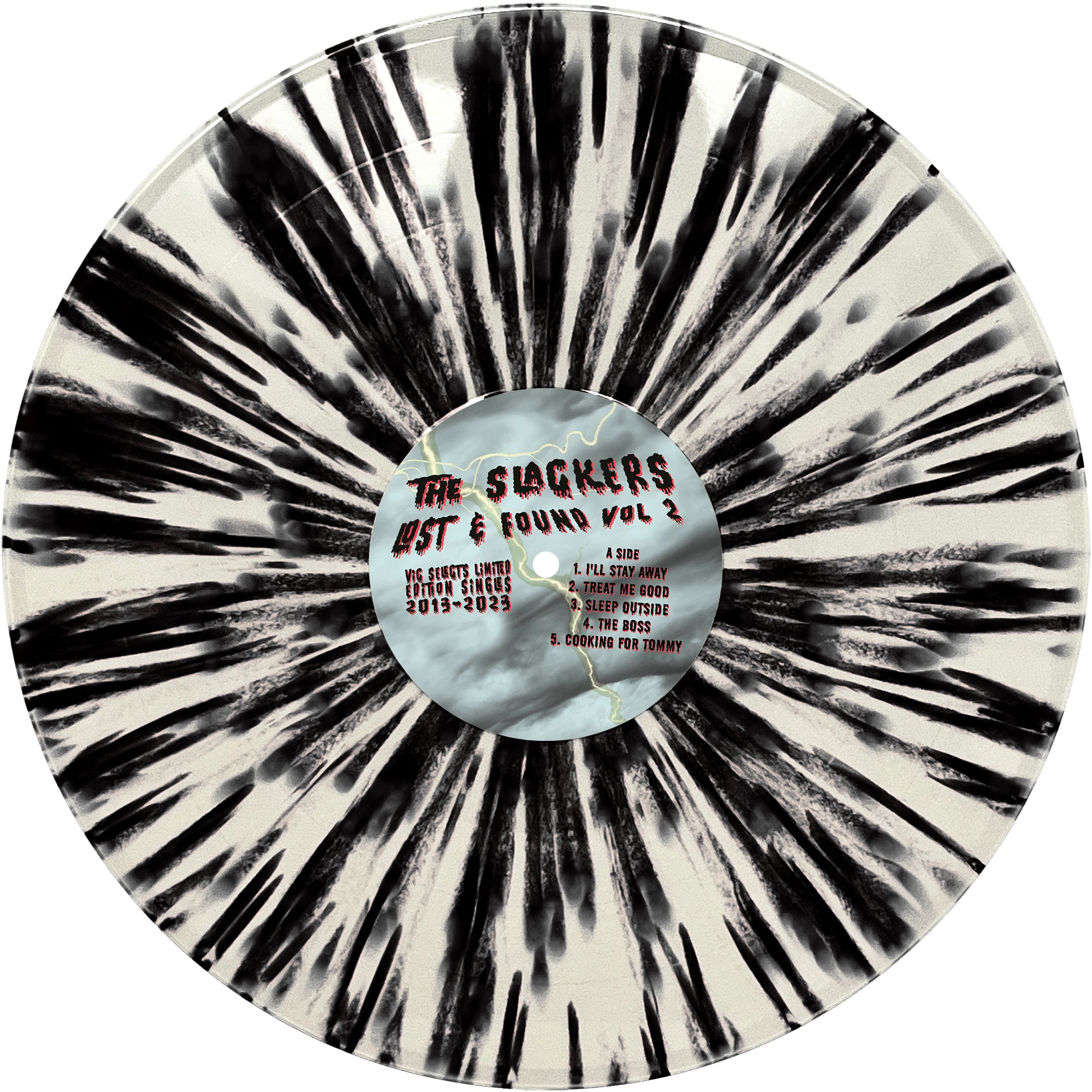 A black and white splatter vinyl record from The Slackers titled “Lost & Found Vol 2.” Its center label lists songs from 2013-2023 on a marble-like background—a unique collector’s item for ska reggae fans.