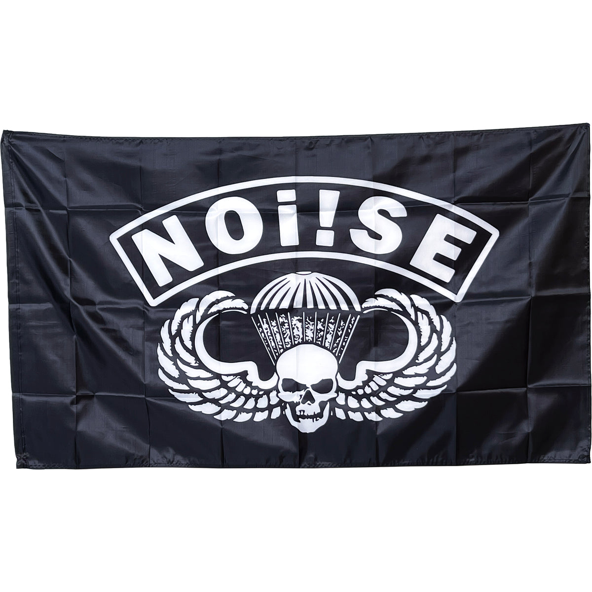 A black flag from NOi!SE features a white parachute logo with a winged skull in a helmet, and displays the brand name boldly above the graphic.