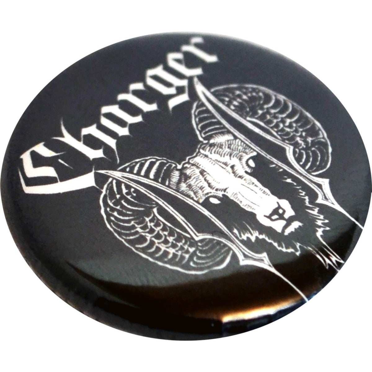 A 1 inch round Charger button badge features a stylized ram&#39;s head with large, curved horns and bold gothic &quot;Charger&quot; lettering above it. The white design pops against the black background.