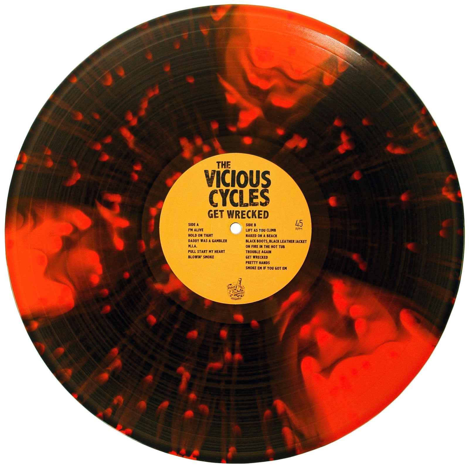A marbled black and orange vinyl record features a yellow center label with The Vicious Cycles Get Wrecked, a garage punk rock party LP, and track info in black text.