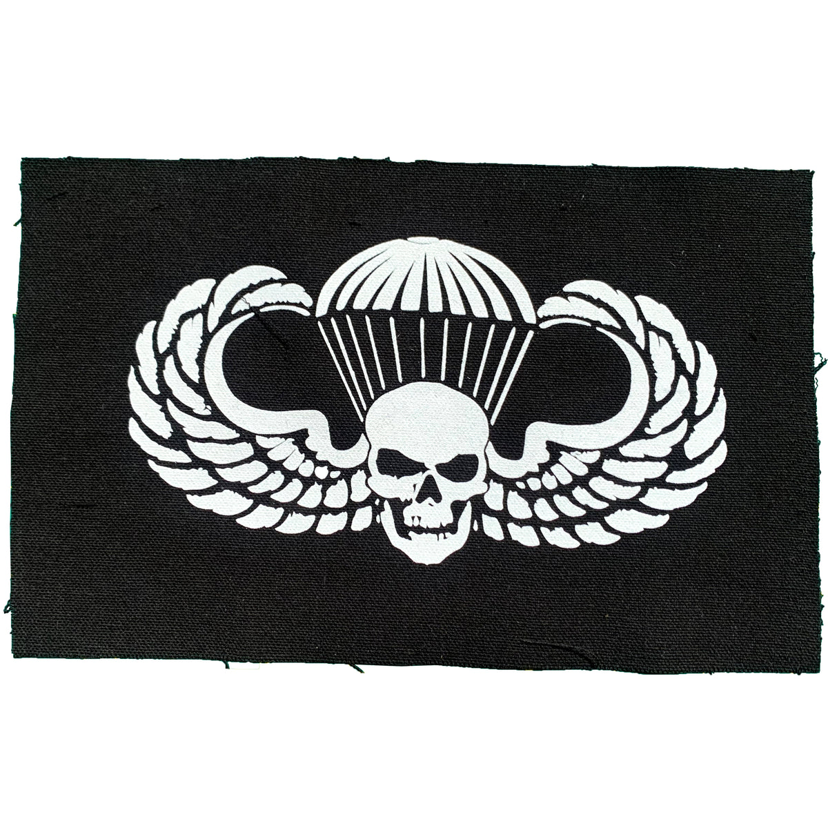 A NOi!SE black cloth patch displaying a white skull with a parachute logo behind it and outspread wings, inspired by the classic NOi!SE patch style.