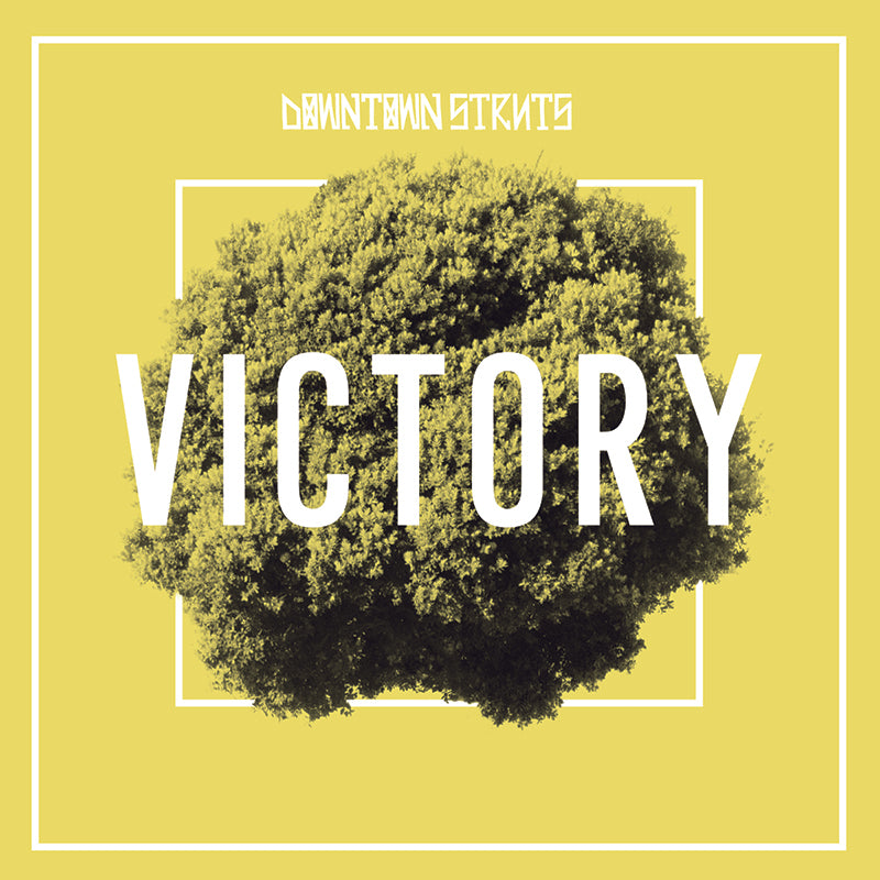 The limited edition 7-inch punk EP from Downtown Struts features a yellow cover with a central green tree, large white VICTORY text across the tree, and DOWNTOWN STRUTS at the top, outlined by clean white lines.