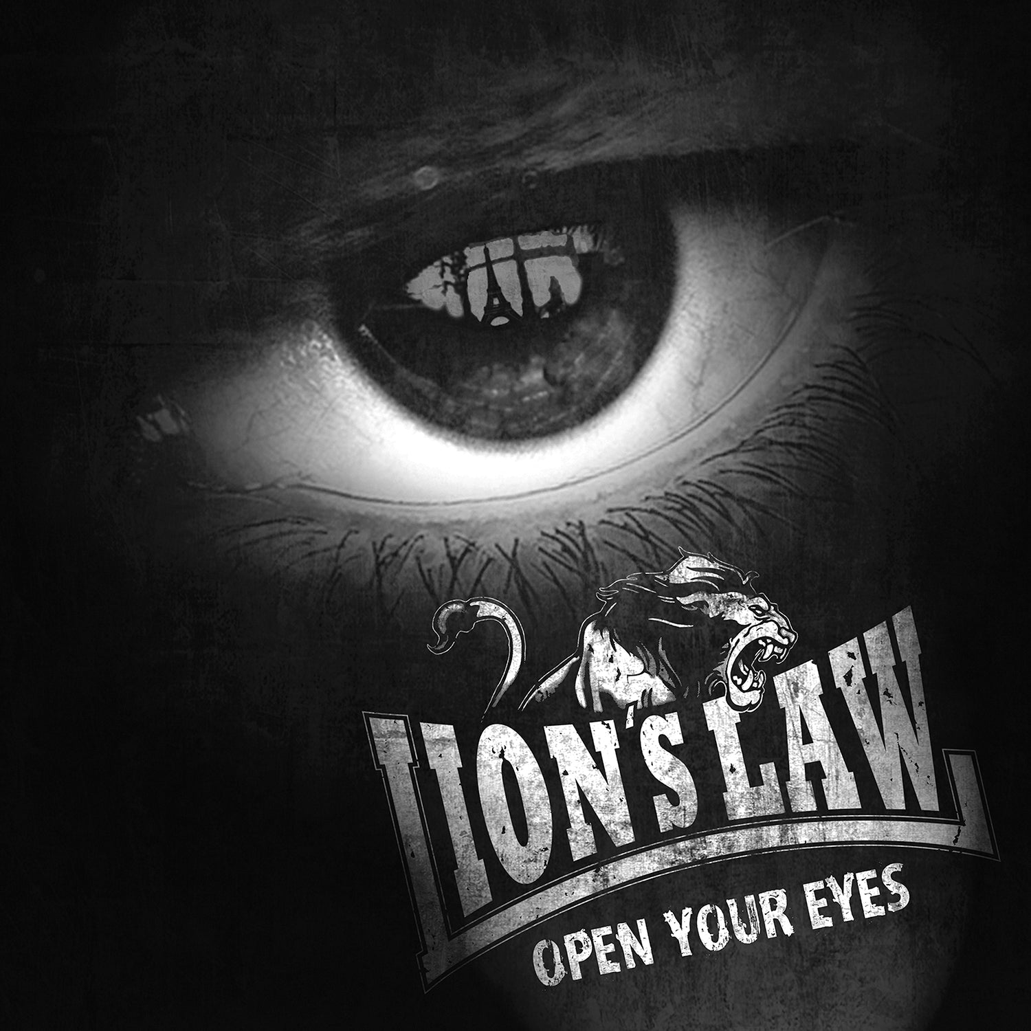 A black and white close-up of a human eye with bold “Lions Law” and “Open Your Eyes” text, plus a roaring lion graphic—paying tribute to the fierce Oi! band vibe and skinhead streetpunk culture.