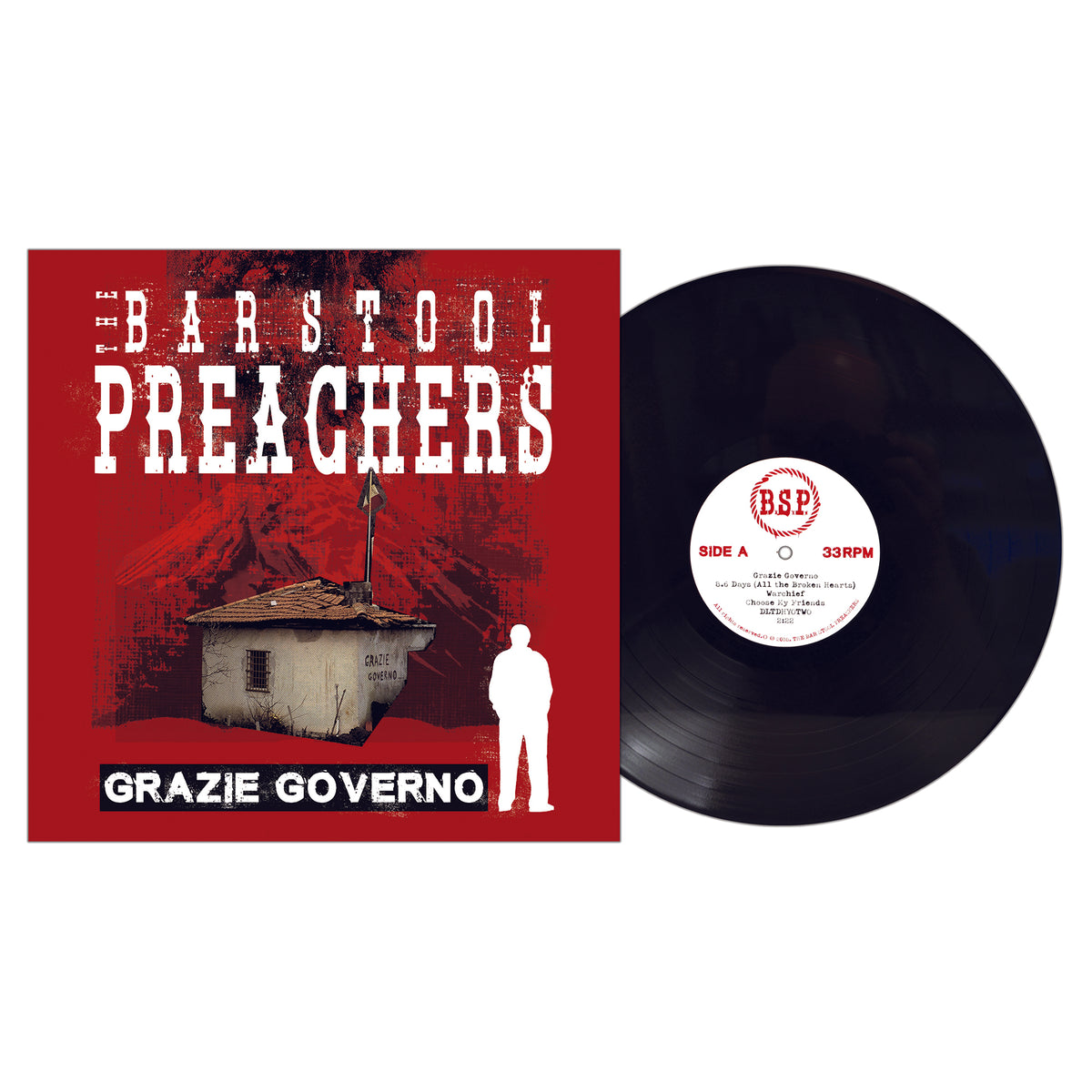 A colored vinyl record sits beside its red album cover, featuring The Bar Stool Preachers and "Grazie Governo" in text. The punk cover displays a silhouetted figure and small house behind a barbed wire fence.