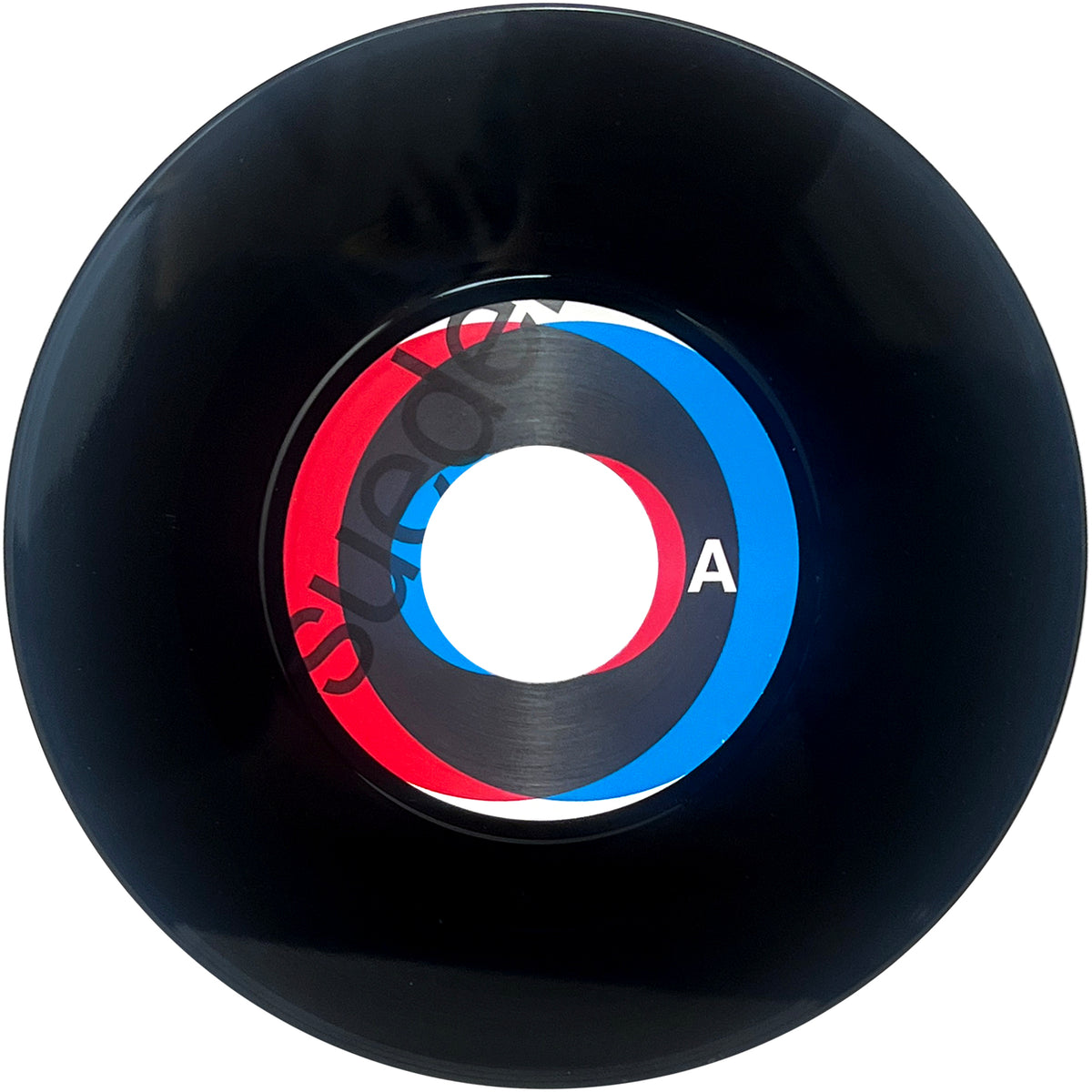 A black vinyl record with a central label decorated by overlapping red, black, and blue circles. The brand name Suedehead and the letter A are printed on the label, capturing the essence of Northern Soul punks and recalling rare finds from the Suedehead discography on labels such as Simba Records.
