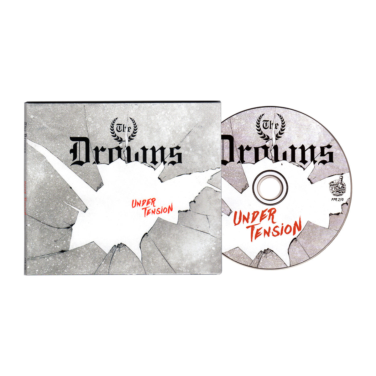 A CD and case for Under Tension by The Drowns, both with cracked glass art and black-red text. This 2020 punk release, produced by Ted Hutt, features matching design as the CD partially slides from its case. Brand: The Drowns.
