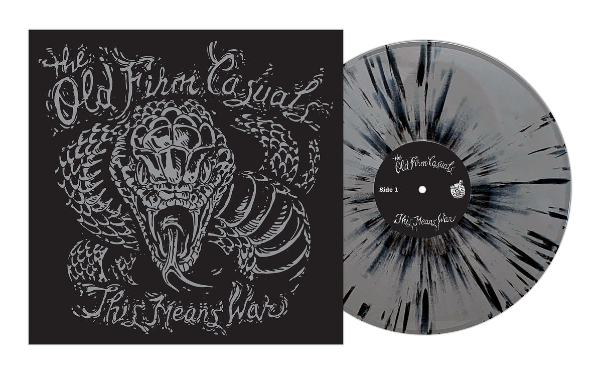 A black and gray splatter vinyl from The Old Firm Casuals sits next to its cover showing an illustrated snake with fangs bared—perfect for streetpunk or Oi! fans.