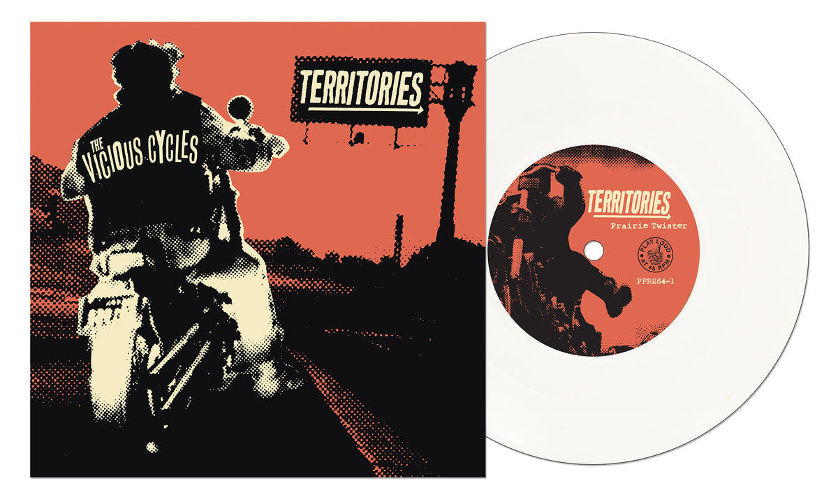 A split 7-inch vinyl from Pirates Press Records rests beside its cover, featuring a silhouette motorcycle rider heading toward a TERRITORIES billboard, The Vicious Cycles on their jacket—punk rock energy set against a bold red backdrop.
