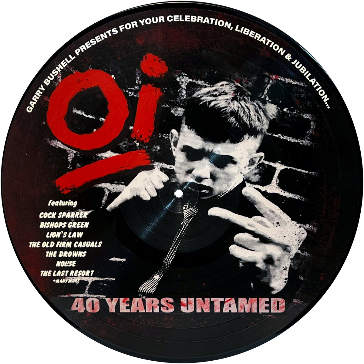 A Pirates Press Records vinyl featuring a young man’s black-and-white photo, Oi! in red graffiti, and a brick wall backdrop celebrating 40 Years Untamed with a list of featured punk bands.