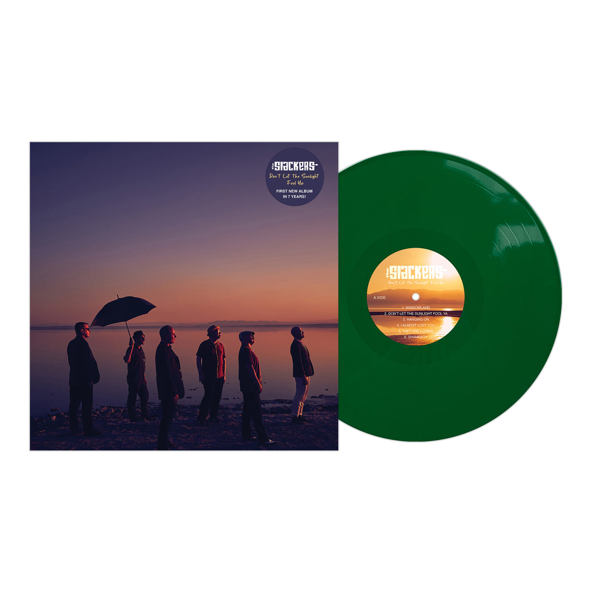 Album cover shows six silhouettes by a lakeshore at sunset, one with an umbrella. Beside it is a green vinyl with a sunset label and The Slackers—New York ska icons from Pirates Press Records. Brand Name: The Slackers.