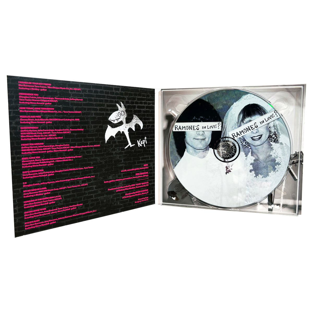 Open CD case with a disc labeled Kepi Ghoulie In Love? featuring a black-and-white photo of a man and woman. The left side lists punk ballads and love songs in pink text on a black brick-patterned background.