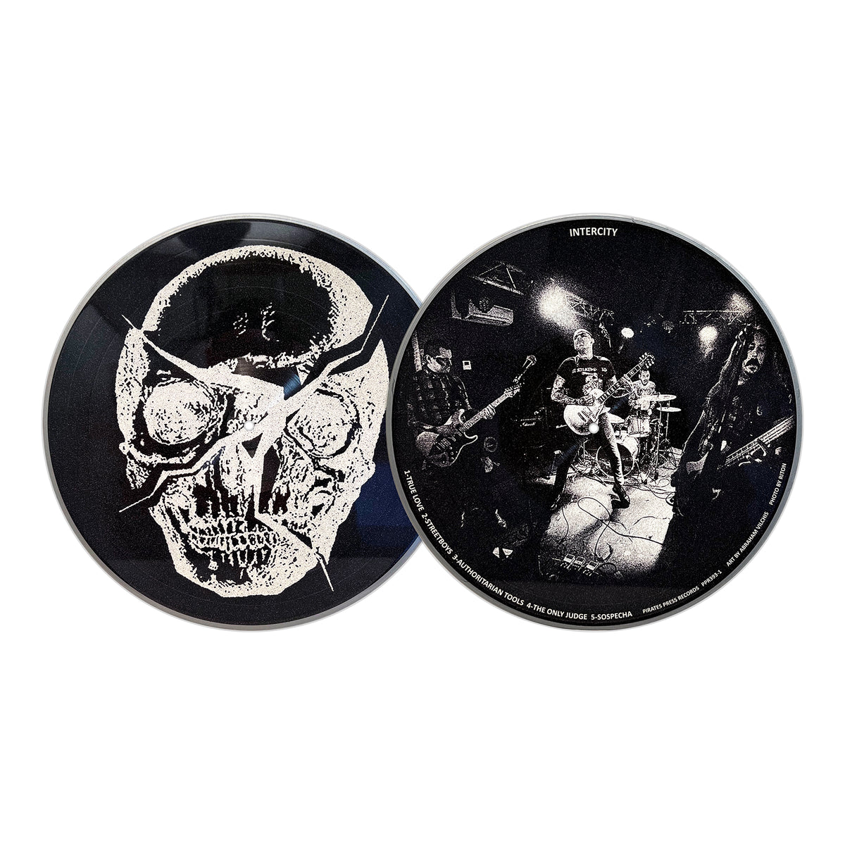 Two Mess vinyl records: one has a streetpunk-style cracked skull graphic with bold lines; the other shows a black-and-white photo of Mess performing Oi! anthems live on stage, their instruments visible under dim lighting.
