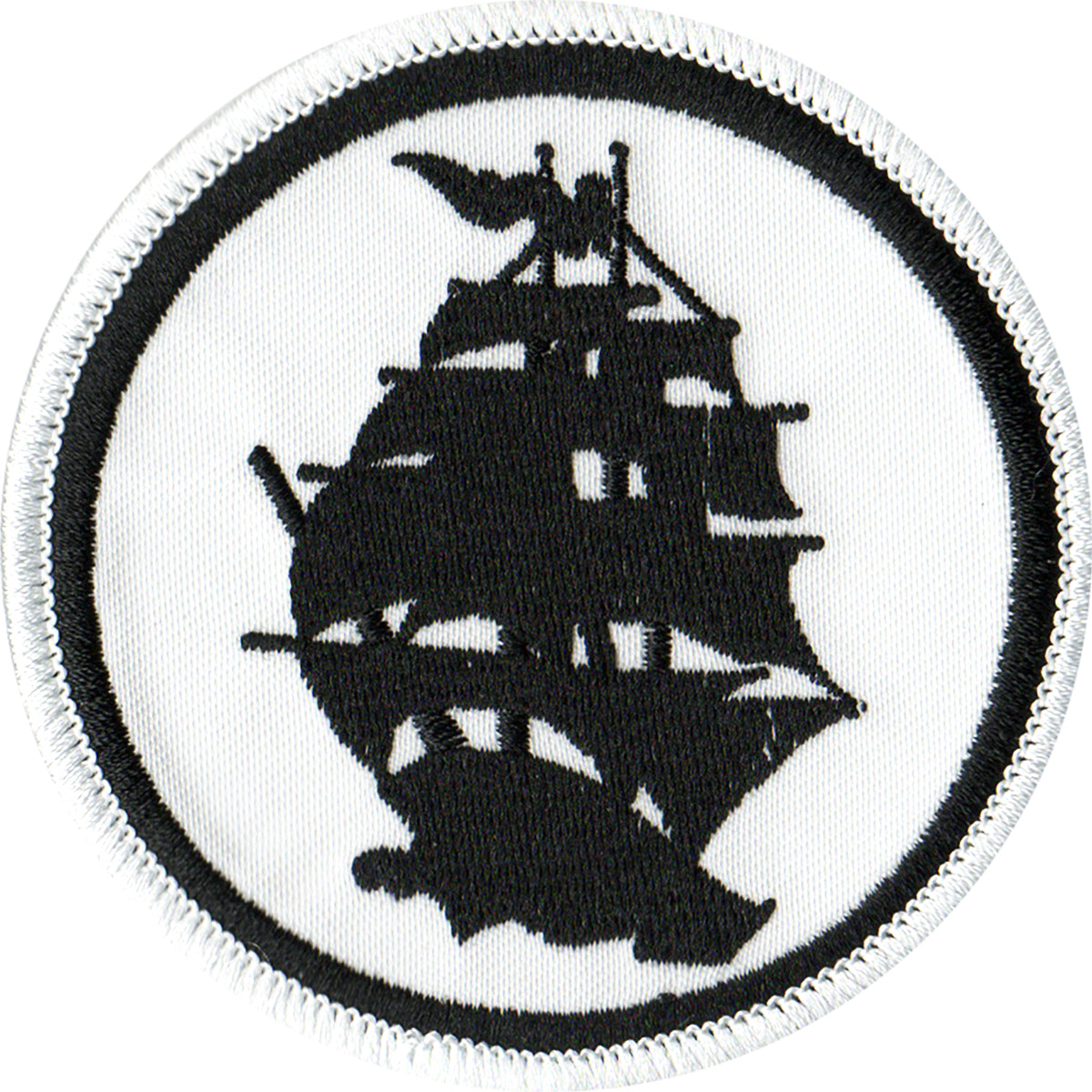 A round embroidered patch with a black silhouette of a tall sailing ship and flag on white, outlined in black—perfect as a logo patch for Pirates Press Records fans.