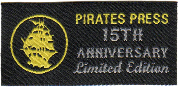 A black patch from Pirates Press Records featuring yellow and white embroidery of a ship with the text “PIRATES PRESS 15TH ANNIVERSARY Limited Edition,” made for the Rock the Ship Festival.