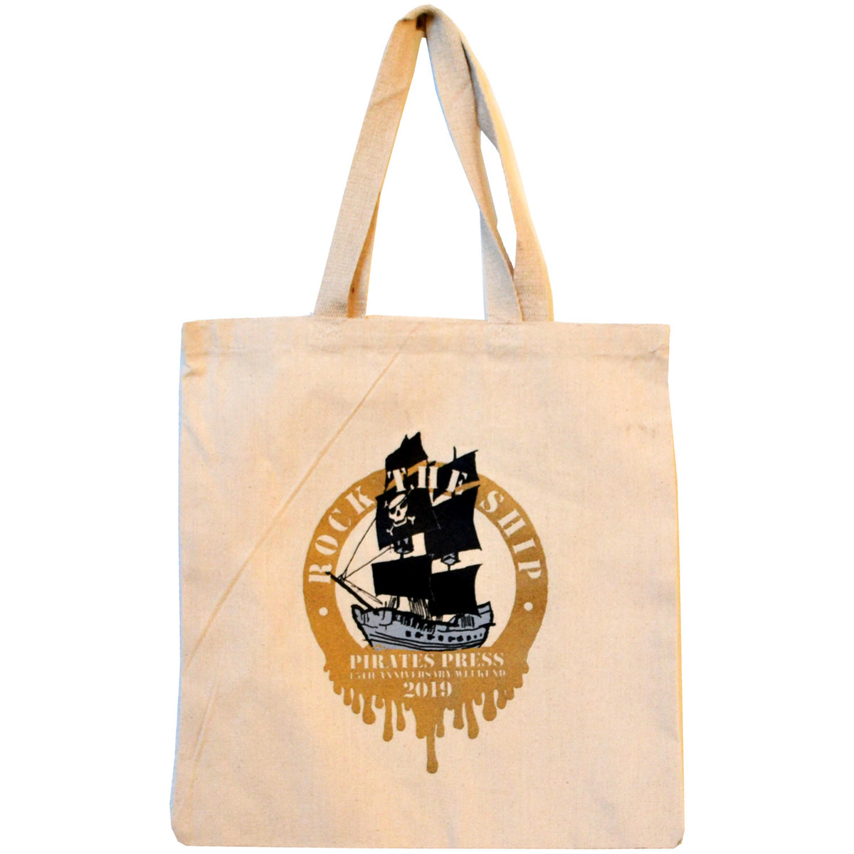 Beige 15th anniversary tote from Pirates Press Records with long handles, featuring a black and gold pirate ship graphic and the text ROCK THE SHIP and PIRATES PRESS 15TH ANNIVERSARY 2019.