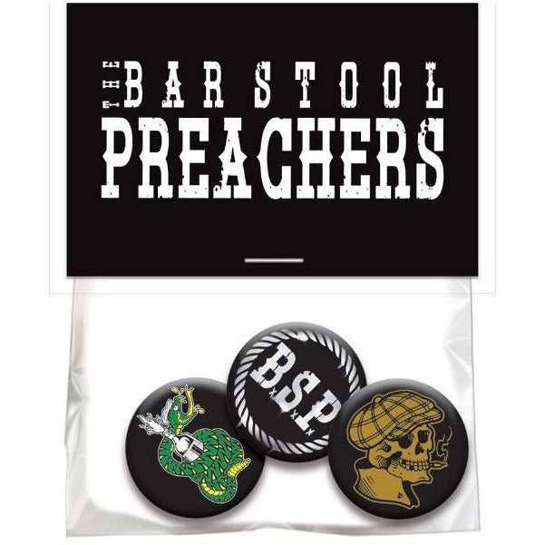 A plastic hang card displays a pack of three band pins with unique designs, topped by a card featuring The Bar Stool Preachers brand name in bold, distressed white letters on a black background.