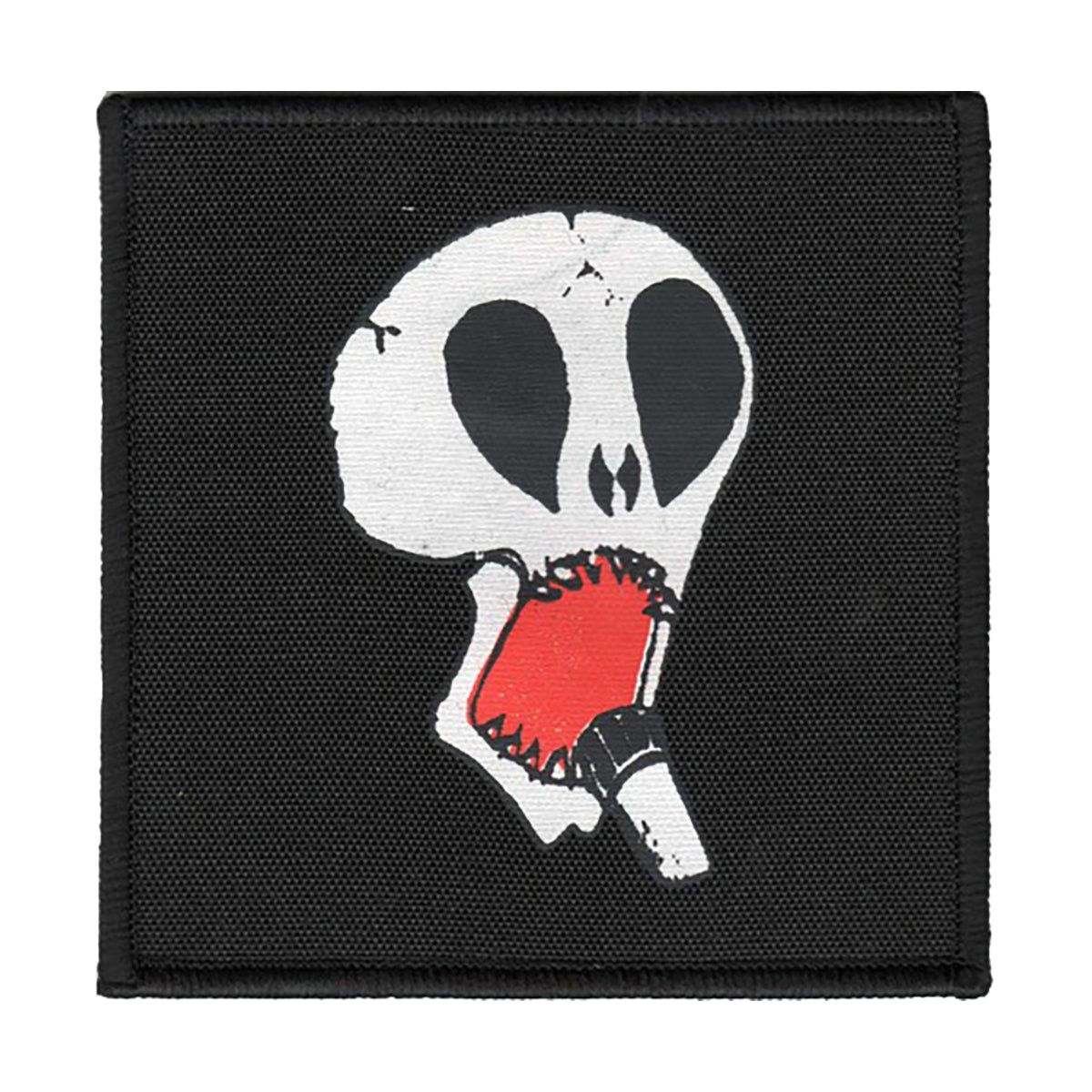 A black Subhumans patch features a white skull logo with large, black eye sockets and a red, open mouth outlined in black, creating a dramatic, stylized appearance.