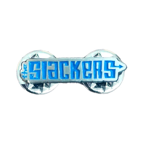A blue and silver enamel pin featuring The Slackers&#39; bold, stylized lettering, with two star-shaped military-style metal clutch backings visible behind it.