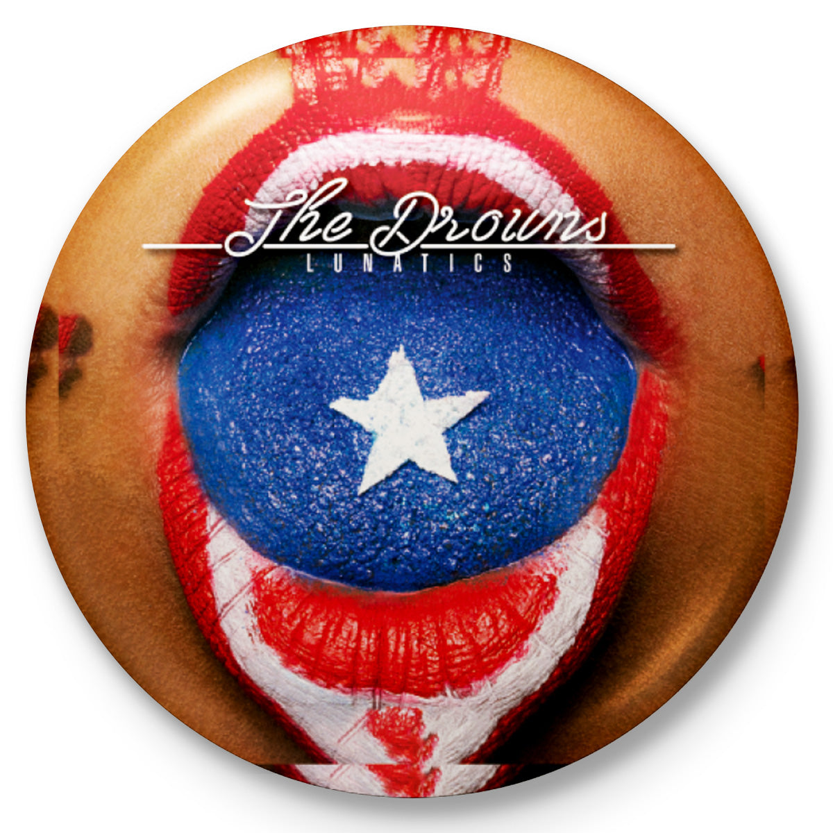 A close-up of lips in red and white, parted to show a blue tongue with a white star button, featuring &quot;The Drowns&quot; text.