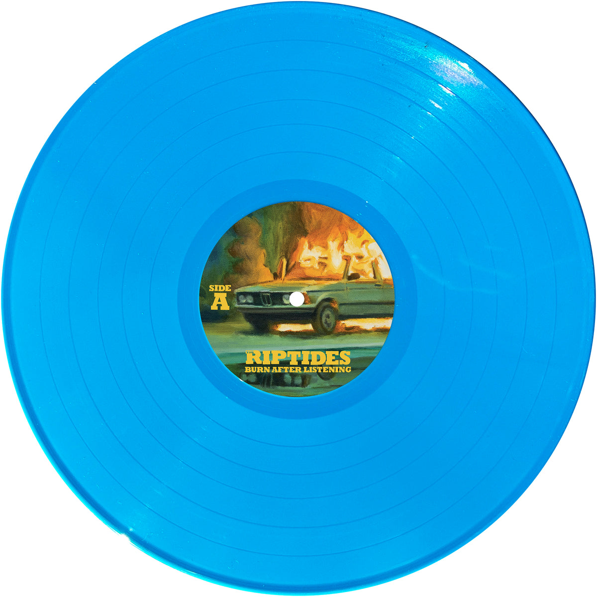 A vivid blue vinyl by The Riptides features a center label with a burning car illustration and Burn After Listening, highlighting their melodic punk rock sound, with Side A printed on the left.