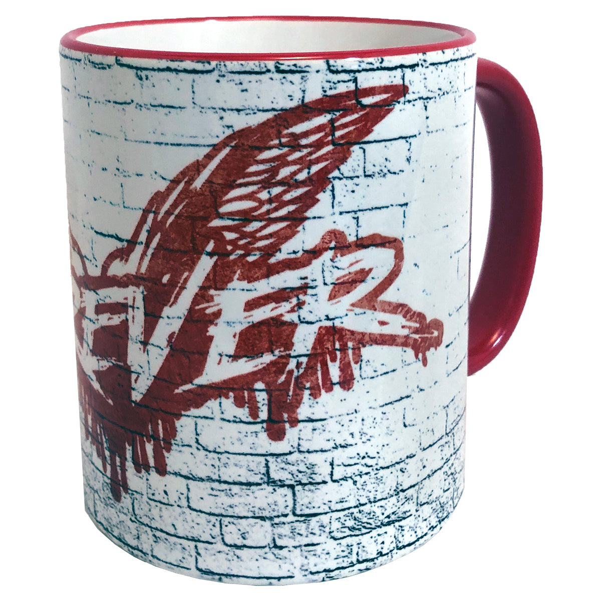 A white 11oz ceramic Cock Sparrer coffee mug with a red interior and handle, featuring graffiti-style red text and wing design on a blue brick wall background.