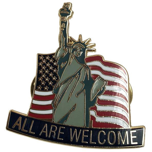 A Lenny Lashley&#39;s Gang Of One pin featuring the Statue of Liberty before an American flag with “ALL ARE WELCOME” at the bottom—a bold All Are Welcome statue design for all.