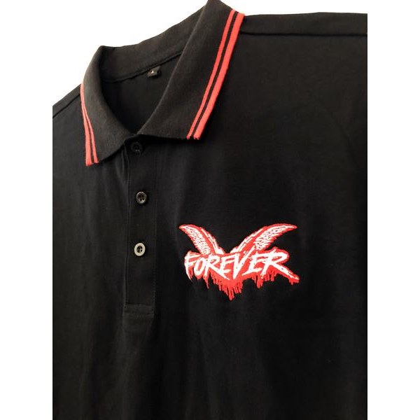 A classic Cock Sparrer black polo shirt with red and white striped collar, “FOREVER” embroidered in red and white on the chest, plus a wing-like embroidered crest behind the text.