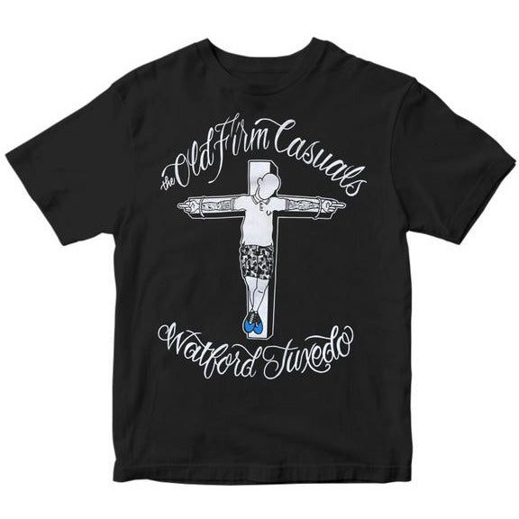 The Old Firm Casuals black Gildan T-shirt with a casual-dressed figure on a cross, band name above, and Watford Tuxedo below in bold white lettering.