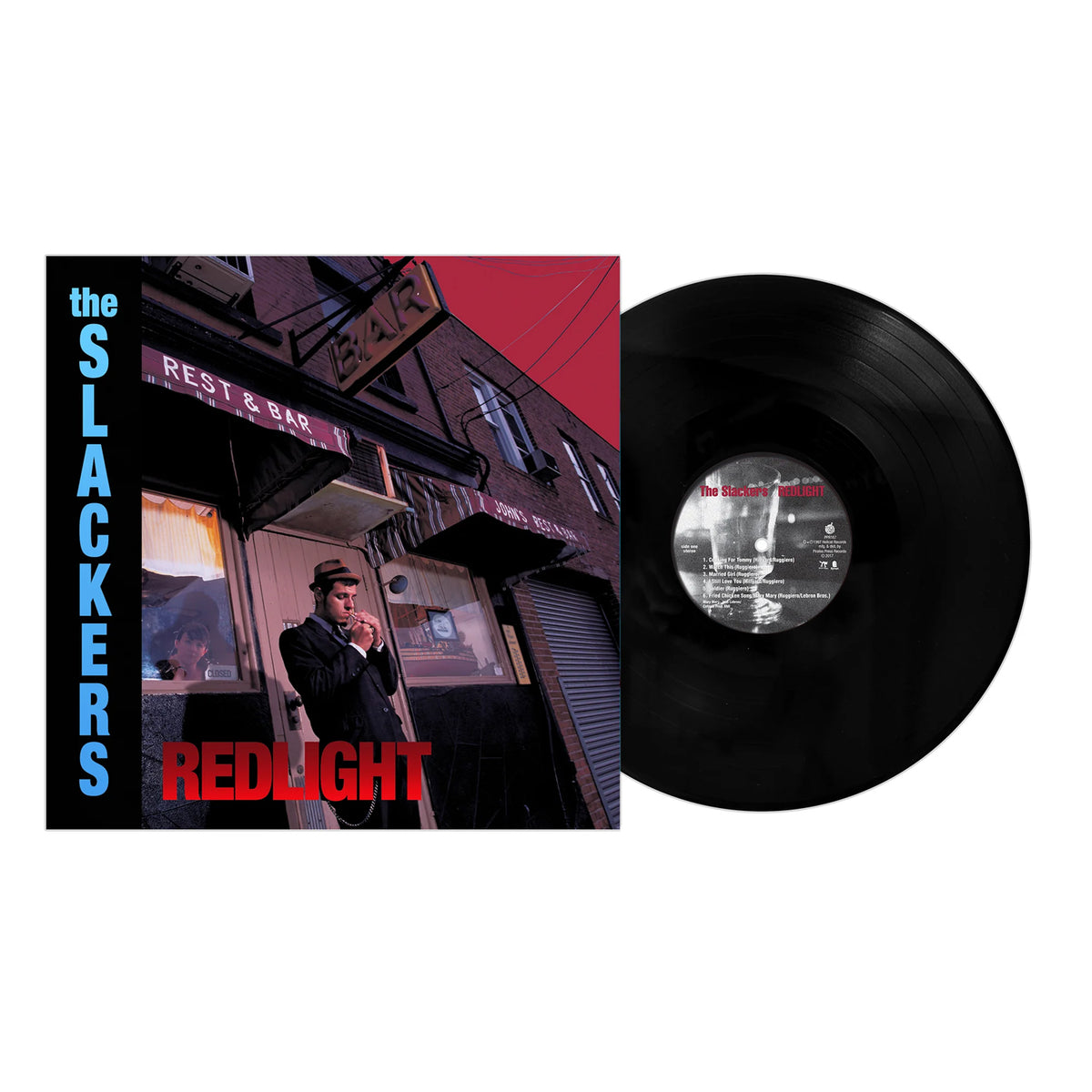A vinyl record and cover for The Slackers Redlight ska album reissue. The artwork features a man in a suit with sunglasses outside a bar, with “the SLACKERS” in blue and “REDLIGHT” in red on the cover. Brand: The Slackers.