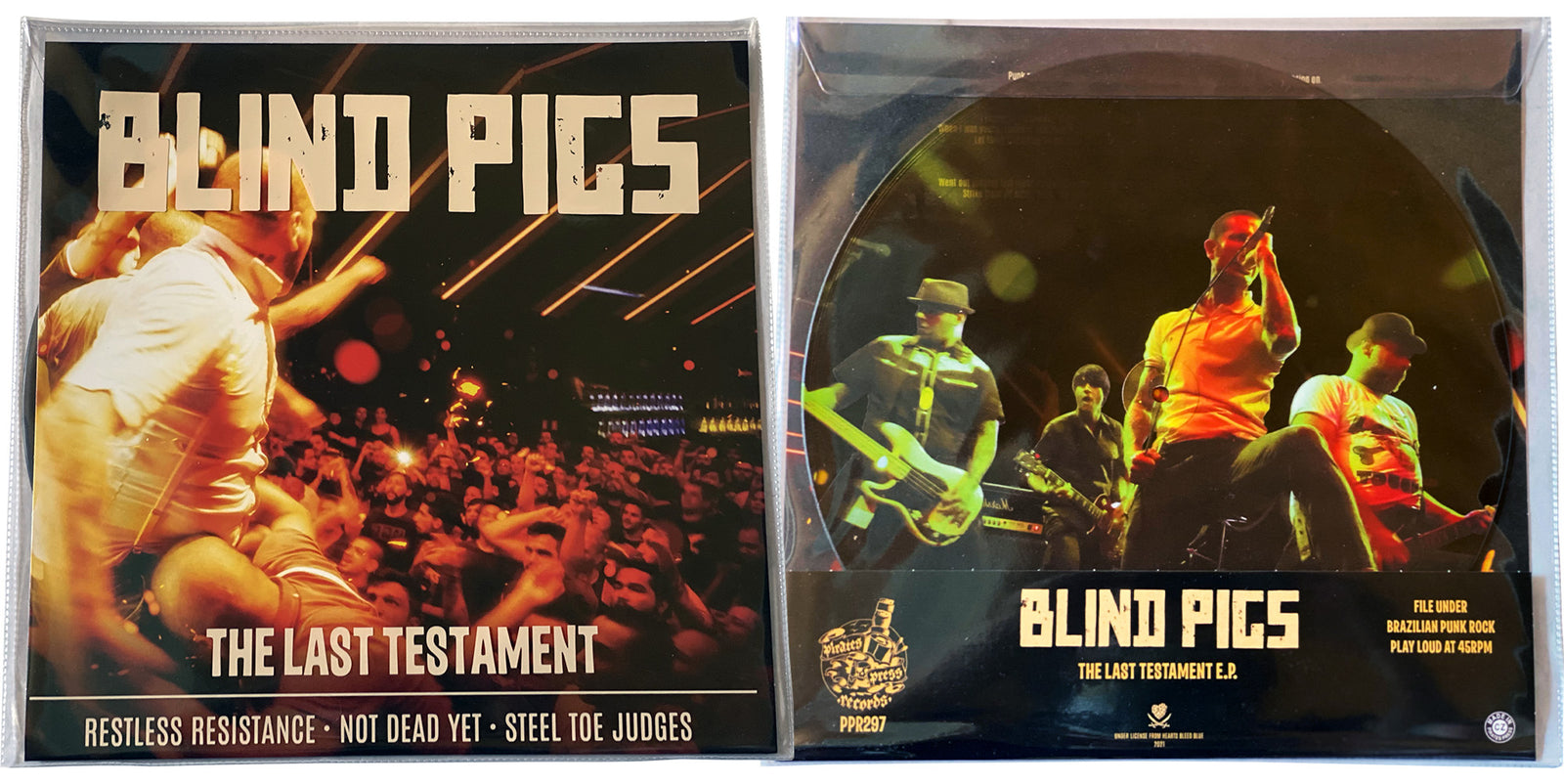 Two vinyl records by Blind Pigs, both titled The Last Testament, are shown. Their covers display live band photos featuring dynamic stage lights and crowd interaction.