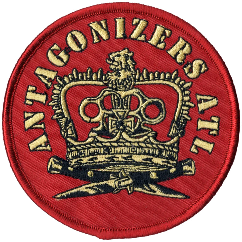 This bold red patch by Antagonizers ATL features a gold crown with brass knuckles and crossed batons, all encircled by &quot;ANTAGONIZERS ATL&quot; in striking gold letters.