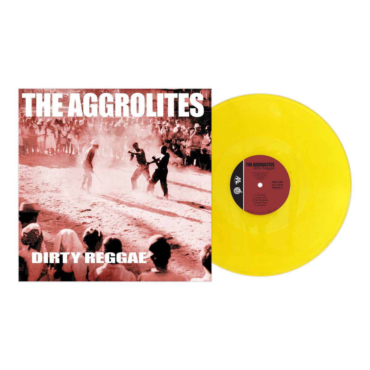 A yellow vinyl record sits beside The Aggrolites Dirty Reggae album cover, which shows a sepia scene of outdoor dancers and bold white text displaying the band’s name and album title.