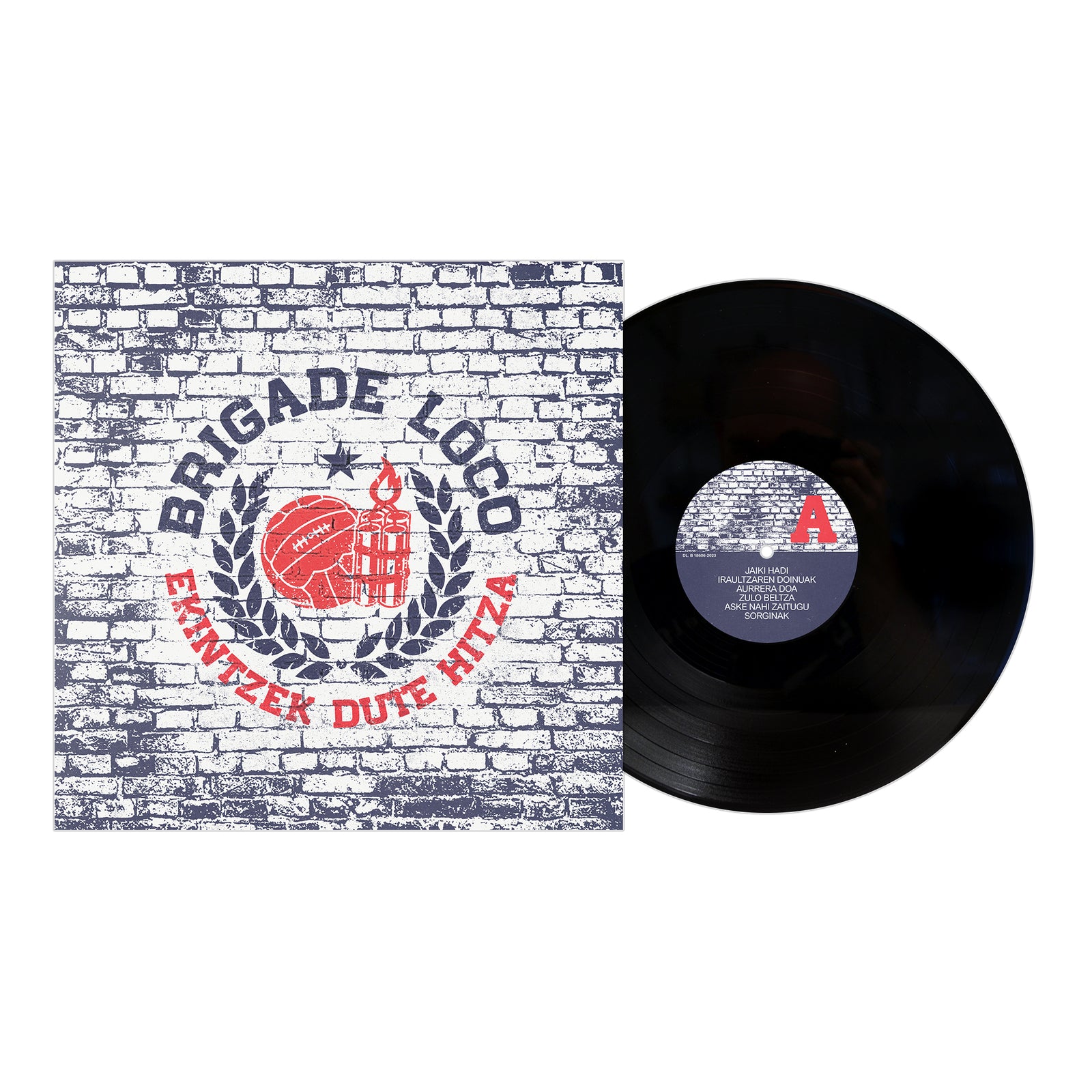 A Brigade Loco vinyl record and cover with a white brick wall design, Basque punk graphics, Ekintzek Dute Hitza in gray and red, a red clenched fist, and an illustrated building framed by laurel leaves.